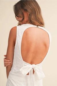 Back view of eyelet open tie sleeveless top with lace and bow detail
