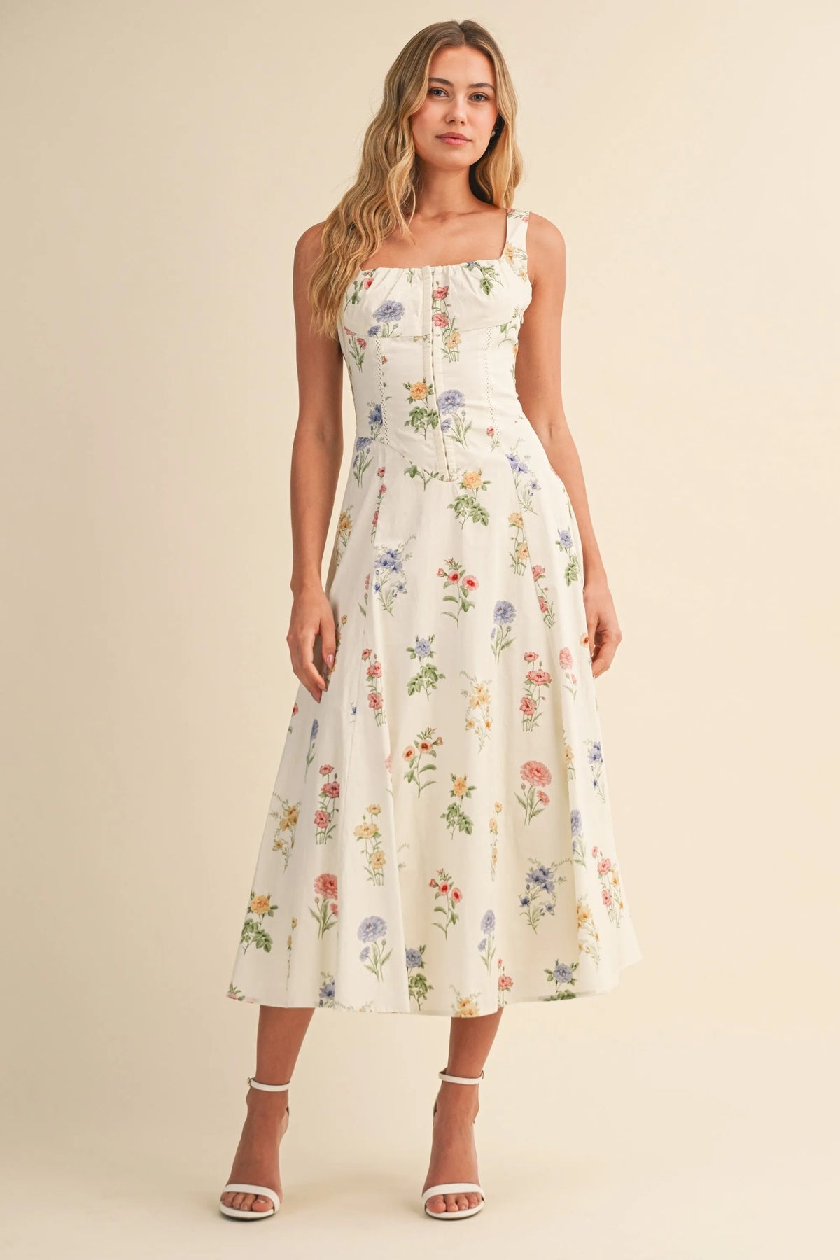 White floral print midi dress with square neckline and thin straps featuring a floral tie back for women’s boho chic clothing