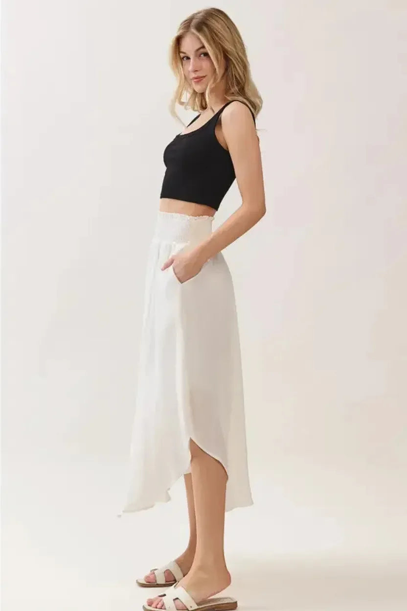White smocked waistband lined rounded hem midi skirt, asymmetrical with side slit