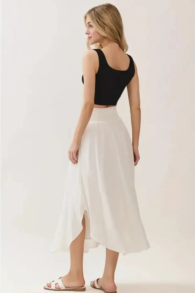 White smocked waistband lined rounded hem midi skirt, asymmetrical with side slit