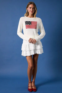 White knit round neck sweater top featuring embroidered american flag print on the chest for casual wear