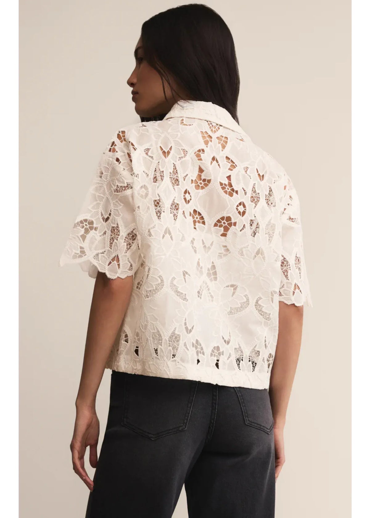 White lace midnight embroidered short sleeve top with puffed sleeves and delicate geometric pattern