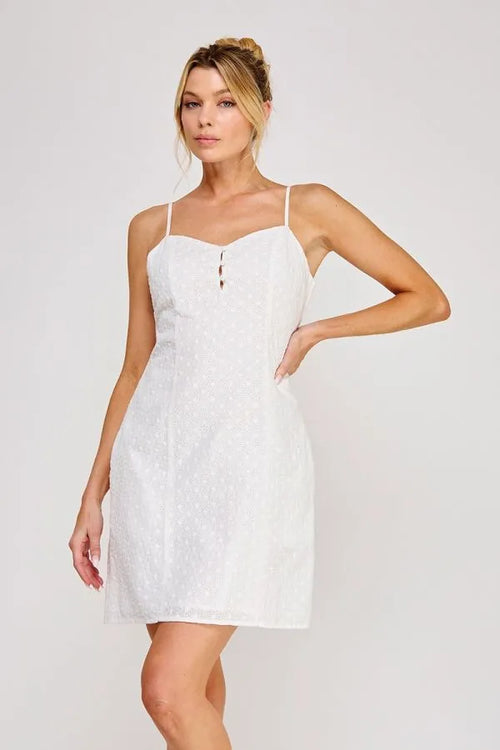 White lace strap sweetheart mini dress with thin spaghetti straps and sweetheart neckline for elegant occasions