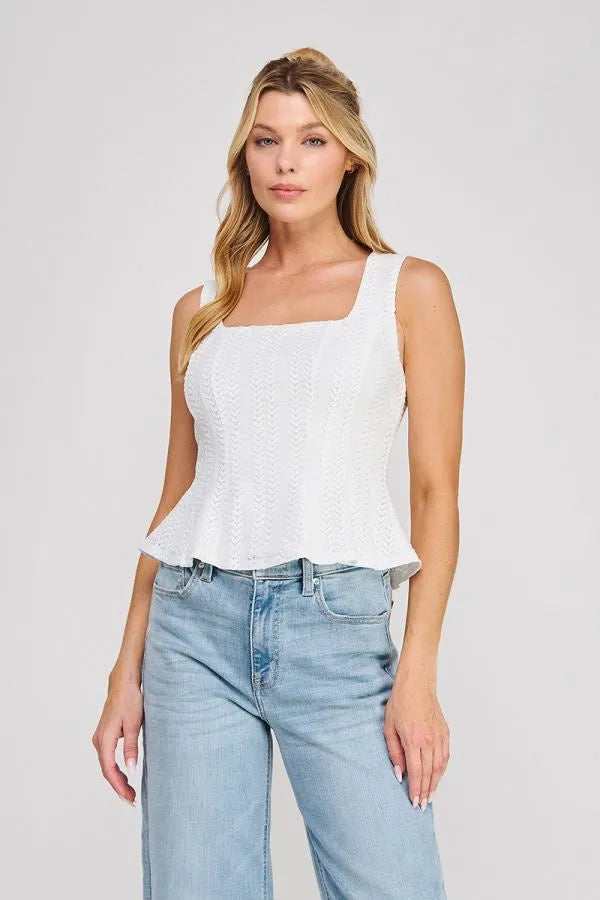 White lace square neck zig zag blouse with peplum hem showcasing elegant feminine detailing