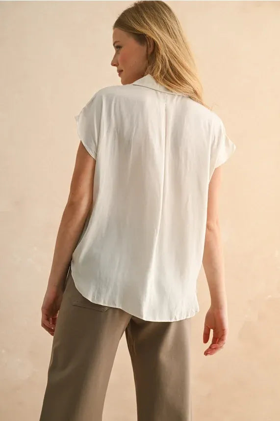 White lightweight button down cap sleeve shirt with short sleeves and relaxed fit for casual wear