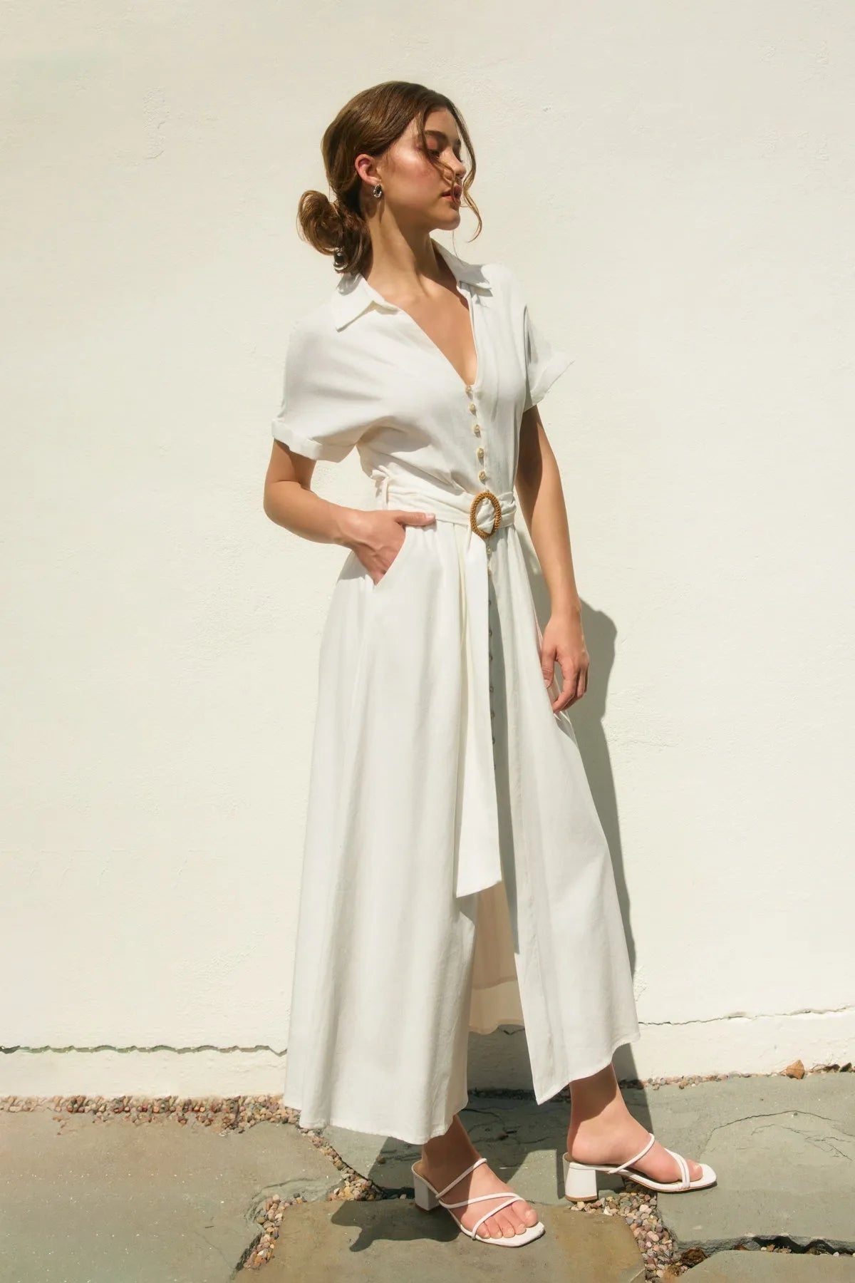 Heaven sent wicker buckle maxi dress featuring a flowing white linen button-front shirt dress with collar and belt