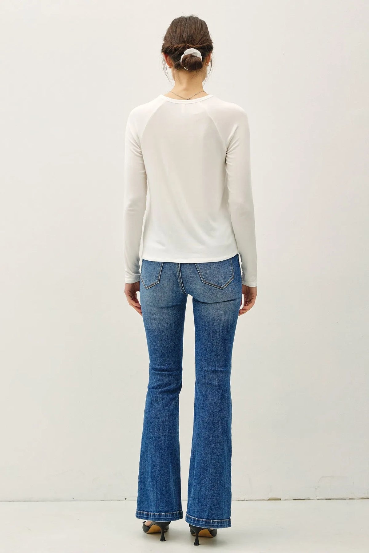White modal raglan sleeve layering basic top with long sleeves and subtle ribbed cuffs for versatile wear
