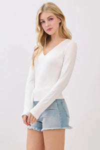 White double layer v neck long sleeve basic top with soft fabric for comfortable everyday wear