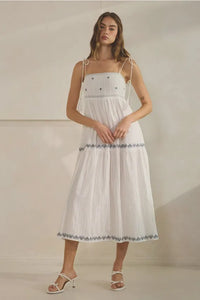 White embroidered tassel maxi dress with flowing midi silhouette