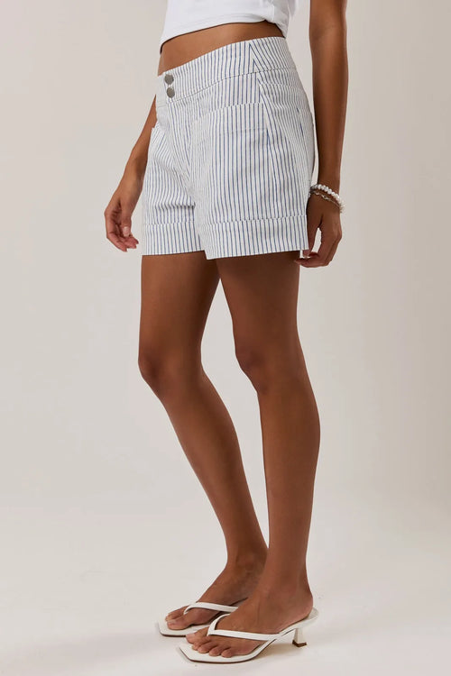 Mid rise stripe short featuring white and navy blue pinstripe shorts with button closure for casual wear