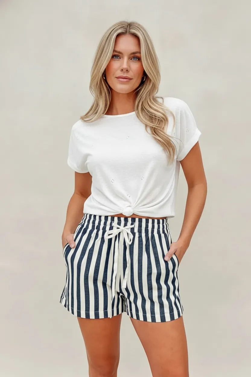 White and navy blue stripes twill denim short with vertical stripes and a drawstring waist for casual wear