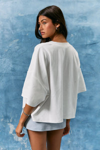 White oversized short sleeve americana graphic top with loose flowing sleeves and relaxed fit
