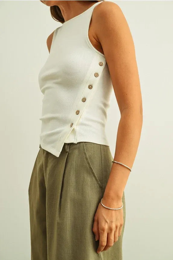 White ribbed sleeveless top with ribbed texture and ribbed button detail down the side for women’s boho chic clothing