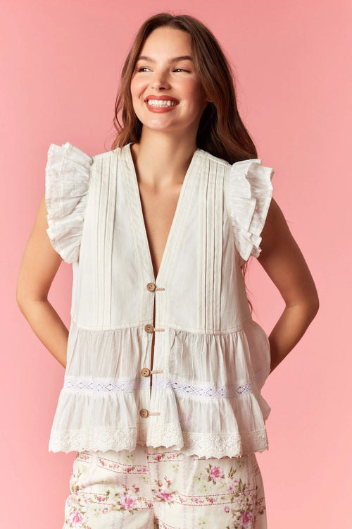 White twill pintuck pleated sleeveless top with ruffles and lace trim