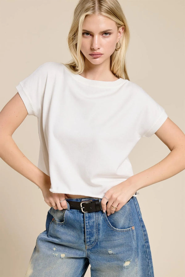 White lightweight knit short sleeve tee with a relaxed fit and soft flowing fabric for comfortable wear
