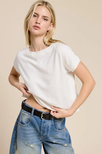 White lightweight knit short sleeve tee with loose fit and rounded neckline for casual wear