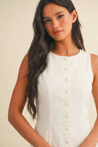White round neck button sleeveless mini dress featuring a button-front design and lightweight fabric for summer wear