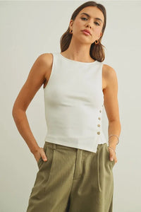 White sleeveless ribbed texture top with ribbed button detailing on the side, perfect for women’s boho chic clothing