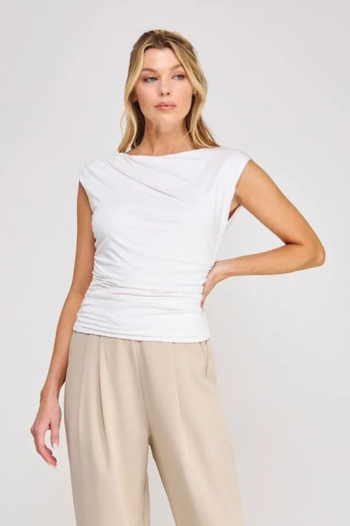 White sleeveless boat neck scrunch tank top with fitted silhouette and elegant draped ruched neckline