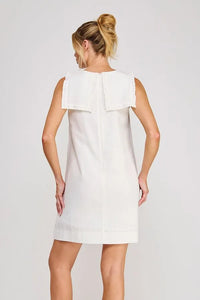White linen blend sleeveless shift mini dress with a prominent structured collar detail