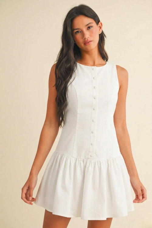 White sleeveless mini dress with round neck button front and flared skirt perfect for summer wear