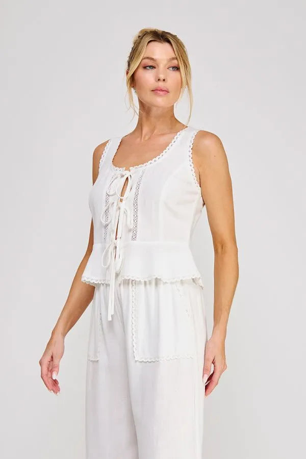 White sleeveless linen blend top with ties lace trim and front tie detail in women’s boho chic clothing style
