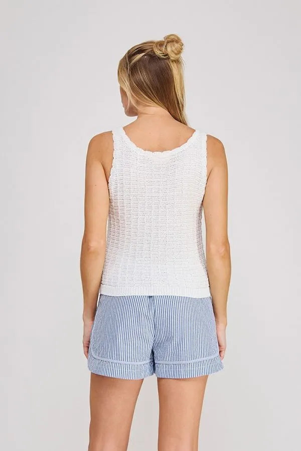 White textured knit sleeveless top featuring a textured button design for women’s boho chic clothing shop daisy