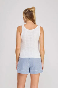 White textured knit sleeveless top featuring a textured button design for women’s boho chic clothing shop daisy