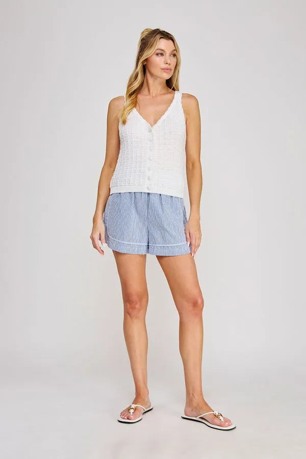 White textured button up tank top with v neck and sleeveless design from shop daisy women’s boho chic clothing