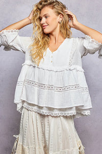 White boho v neck half sleeve relaxed fit blouse with delicate lace trim and button details