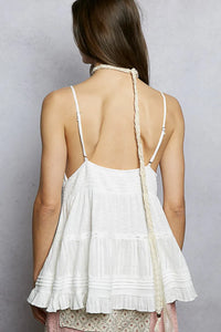 White sleeveless relaxed fit v neck top with delicate lace straps and braided cord detail at the back