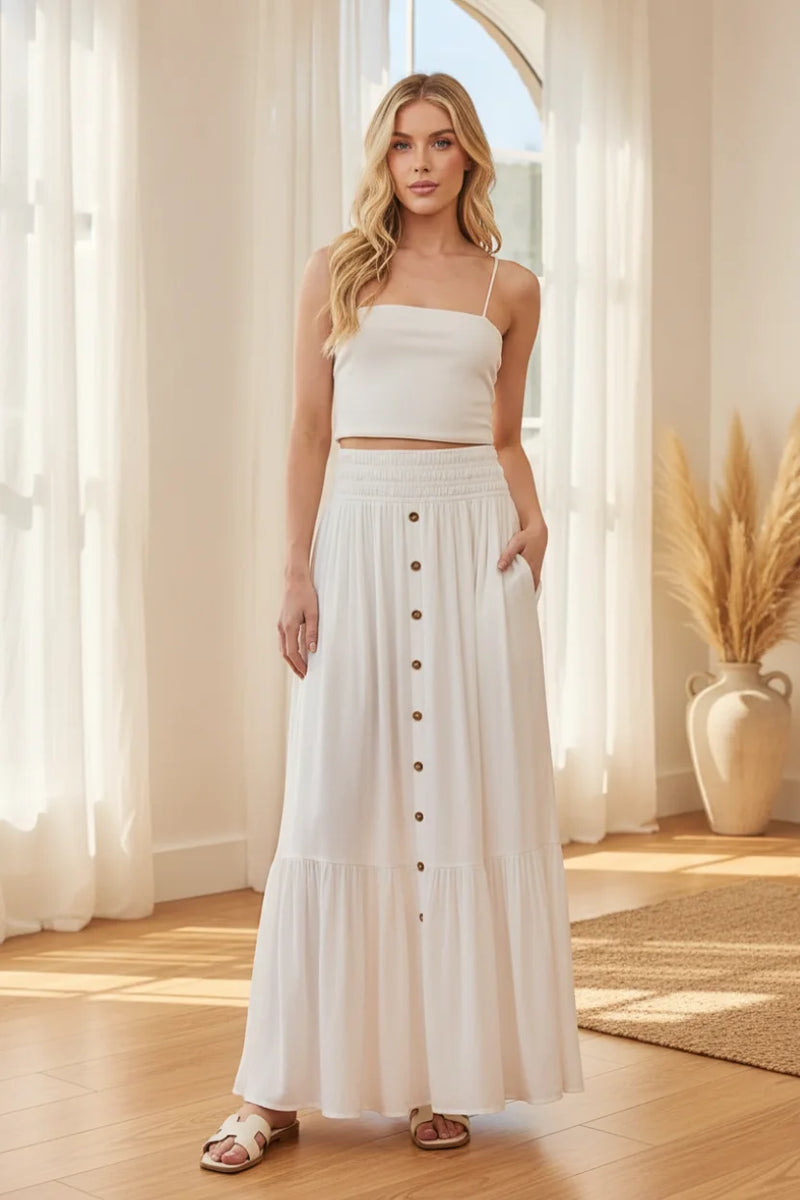 White ruffled smocked waist maxi skirt with button front