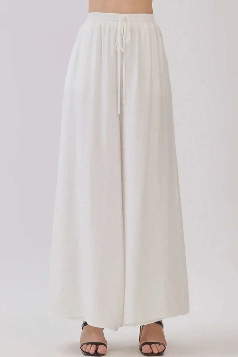 White drawstring waist wide leg pants, back view
