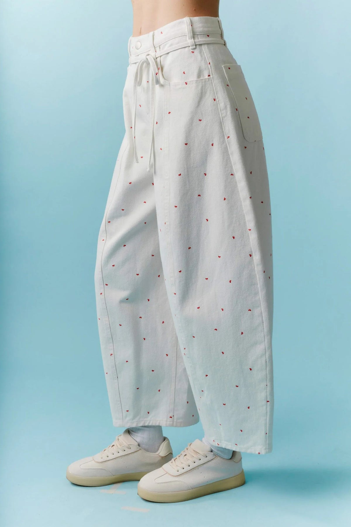 High waist white wide-leg pants with mini bow print red dots and drawstring waistband for casual wear