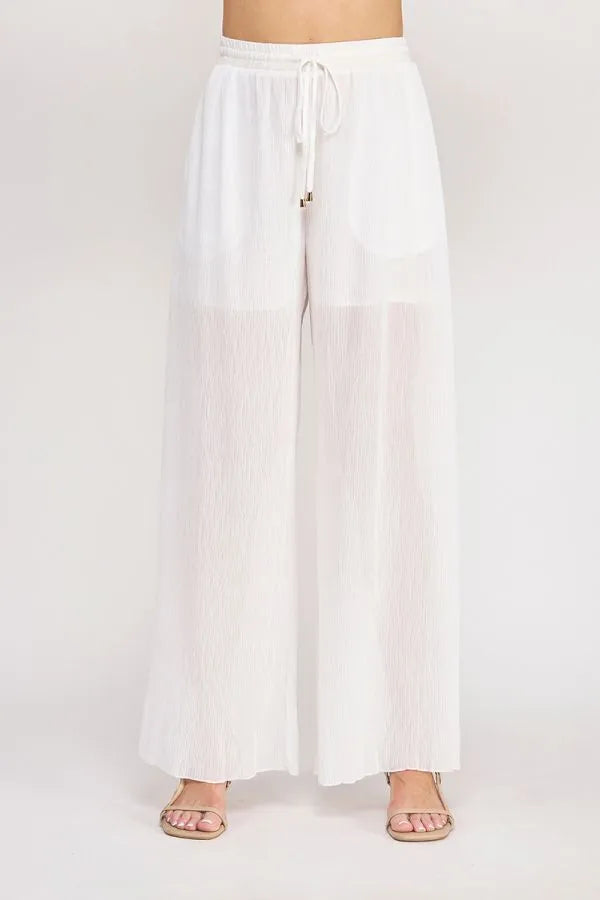 White wide-leg pants with elastic tie waist featuring textured woven sheer pleated fabric for elegant wear