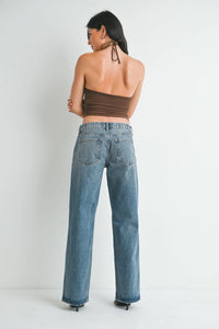 Wide-leg medium-wash blue denim jeans with classic stitching and back pockets low rise baggy slouchy denim style