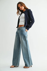 Low rise baggy wide leg denim jeans in light blue wash with a relaxed straight-cut silhouette