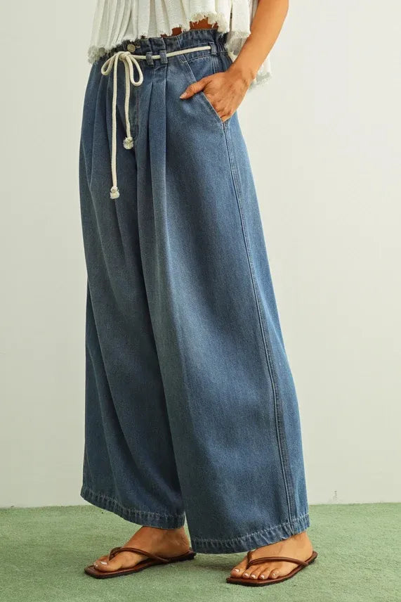 Pleated cotton belt denim pants in medium blue with wide legs elastic waistband and white drawstring cotton belt design