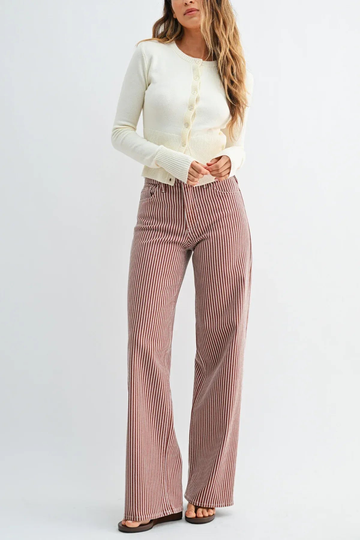 High rise relaxed wide leg denim jeans in pink and white striped cotton with a relaxed wide leg fit