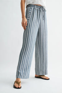 Striped wide leg drawstring pants in soft blue and white vertical stripes made from lightweight woven fabric