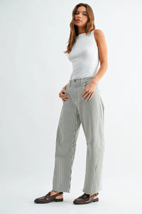 The seamed barrel wide leg denim jeans feature black and white vertical striped lightweight fabric with a relaxed fit