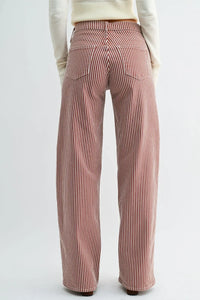 High rise relaxed wide leg cotton trousers in red and white vertical stripes with a relaxed wide leg fit