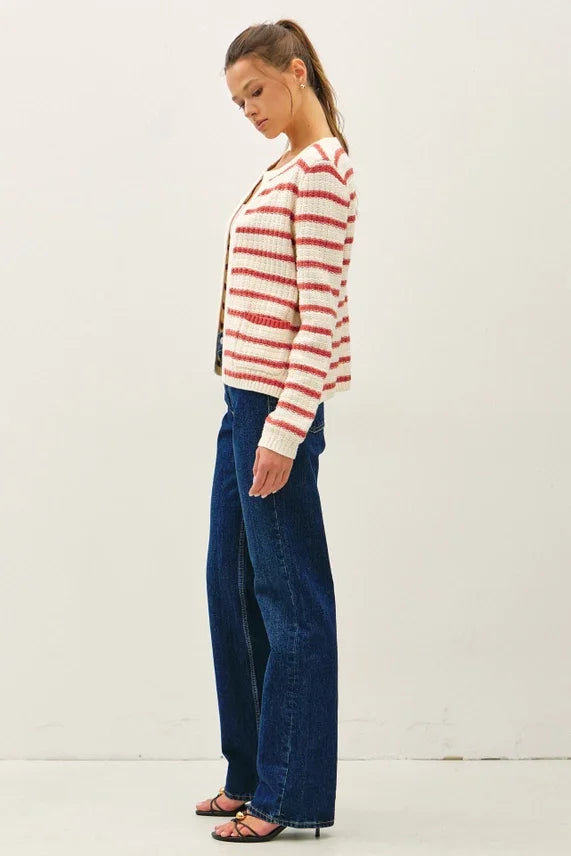 Woman in chunky knit striped open cardigan with red white horizontal stripes