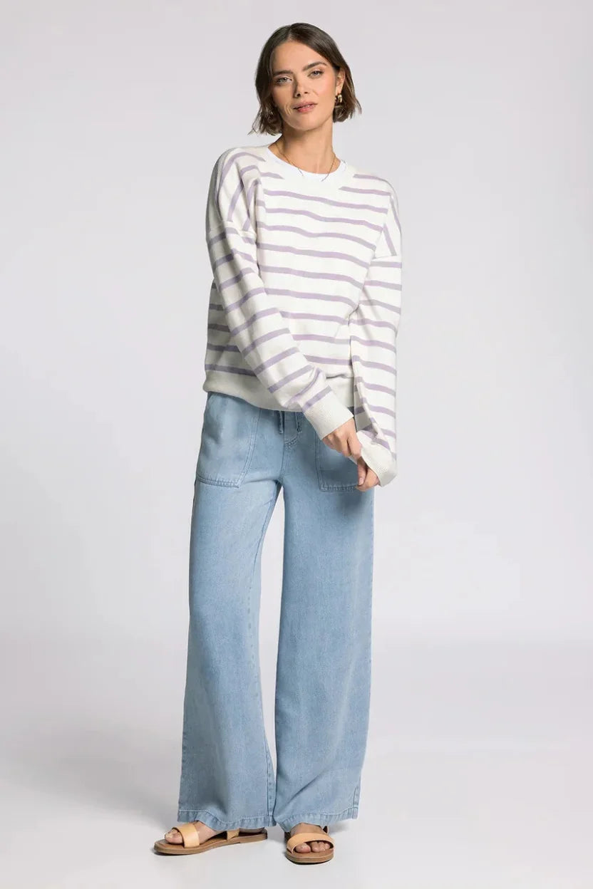 Woman in Thread & Supply Preston Sweater with wide-leg jeans