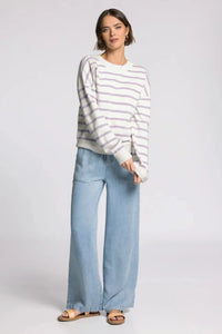 Woman in Thread & Supply Preston Sweater with wide-leg jeans