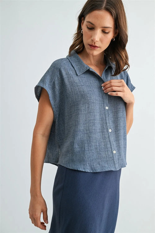 Women’s blue textured linen blend dolman sleeve button down shirt with short sleeves classic collar and white buttons