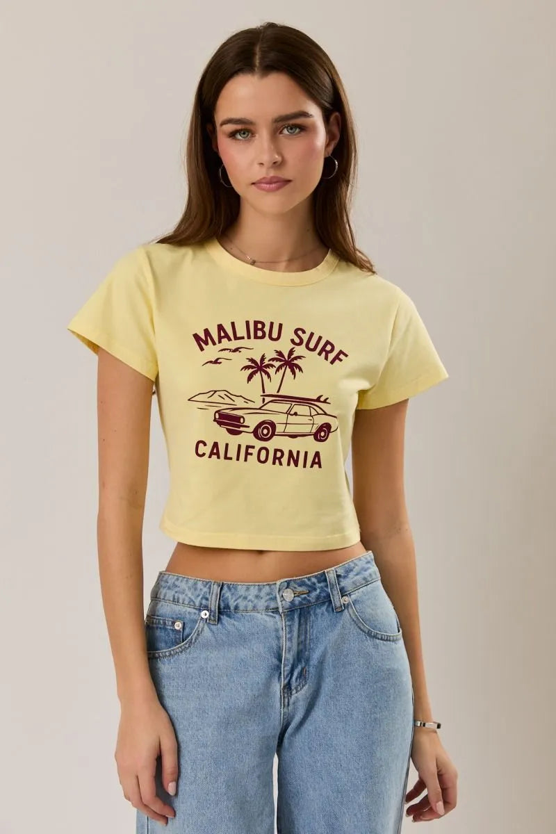 Yellow cropped baby tee with maroon malibu surf graphic featuring palm trees and a vintage car design