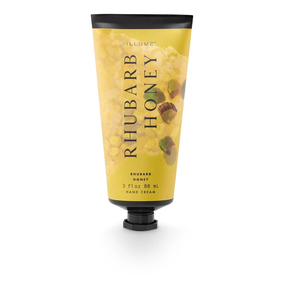 Yellow tube of illume rhubarb honey hand cream with black pump cap for moisturizing honey hand cream use