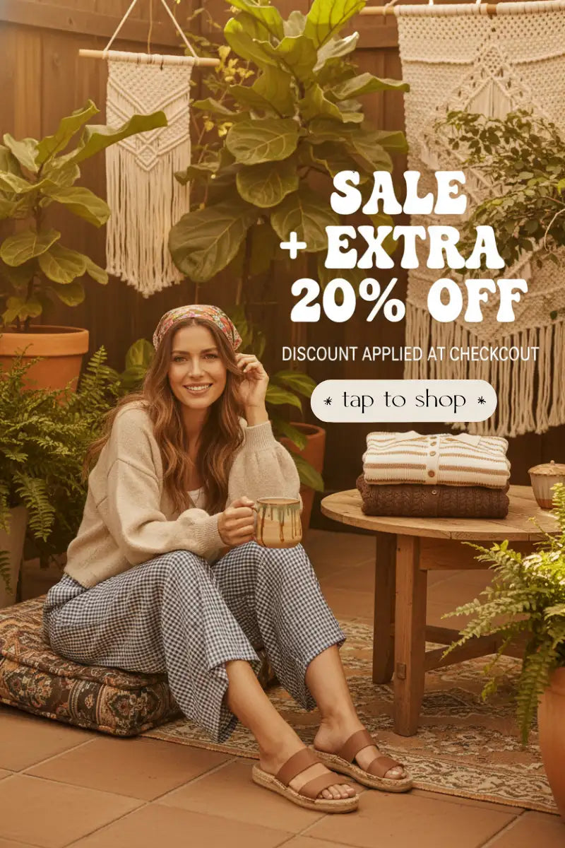 Brown leather birkenstock sandals with wooden straps and silver buckle