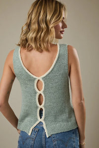 Round neck sleeveless knit tank top in light green with cream lace-up back